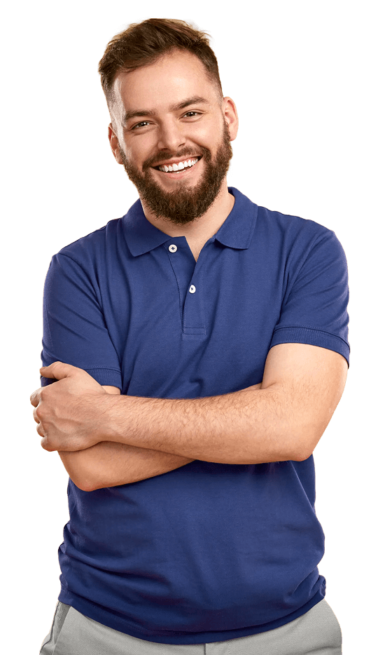 A young man standing with folded arms